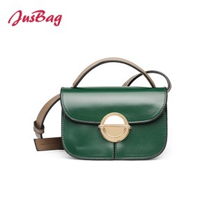 Crossbody clutch bag with circle buckle